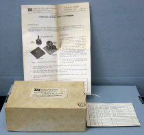 Box and associated papers.